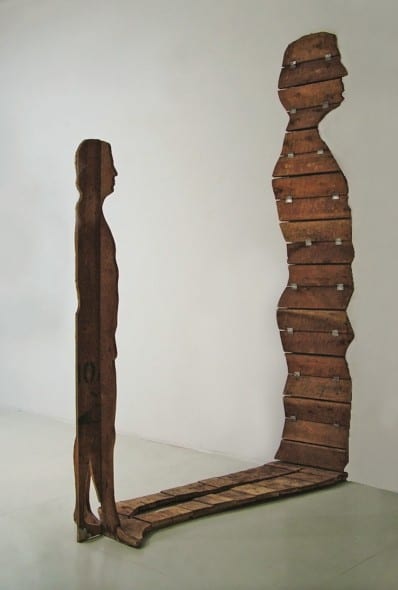 MARIO CEROLI L’UOMO E LA SUA OMBRA Legno H. 186 cm. (uomo) e h. 230 cm. ca. (ombra), Eseguito nel 1967 Stima: €60.000-80.000