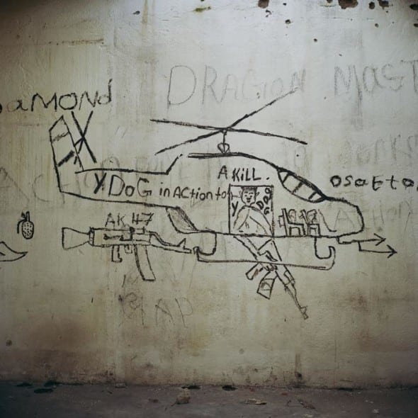 LIBERIA. 2004. War graffiti left during the various parts of the Liberian civil war by Tim Hetherington