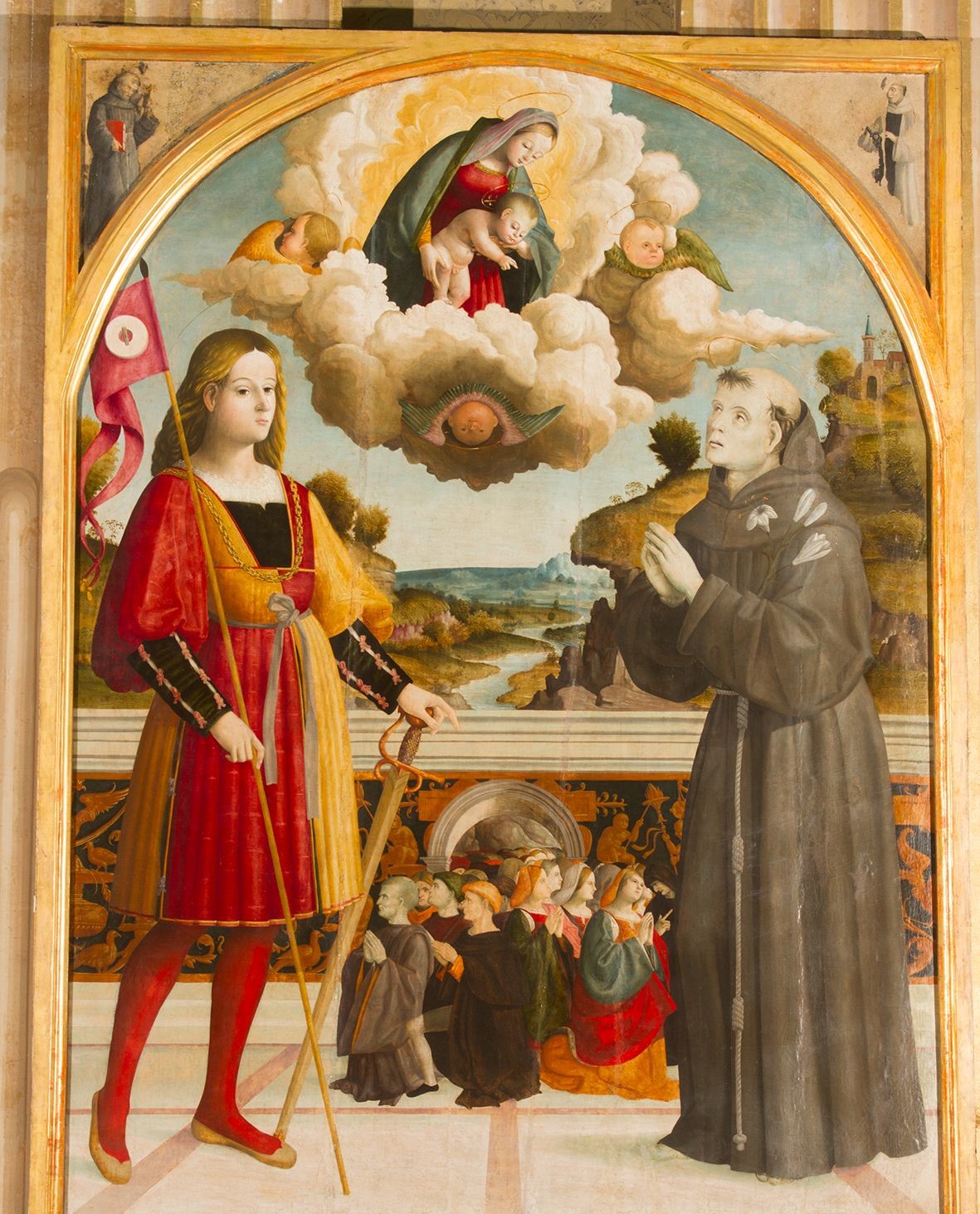 Lorenzo di Giovanni de Carris detto il Giuda Madonna col Bambino in gloria tra i santi Giuliano e Antonio da Padova 1515 ca. Olio su tavola Macerata, Duomo