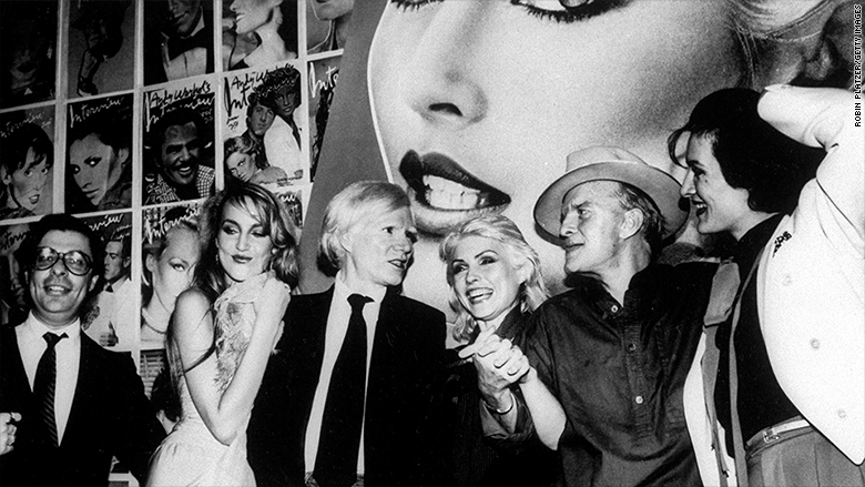 (L-R) Editor Bob Colacello, model Jerry Hall, artist/publisher Andy Warhol, singer Debbie Harry, writer Truman Capote and jewelry designer Paloma Picasso at a Studio 54 party for INTERVIEW magazine and Harry's appearance on the cover. (Photo by Robin Platzer/Twin Images/The LIFE Images Collection/Getty Images)