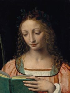 508 BERNARDINO LUINI (LUINO VERS 1480/85-VERS 1532 MILAN ?) Une figure de sainte, en buste, avec une palme et lisant les Ecritures 400,000-600,000 €1,207,500 £1,073,333 $1,369,573