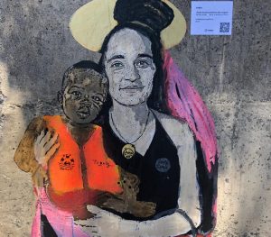 SANTA CAROLA PROTETTRICE DEI RIFUGIATI (PARTICOLARE) Tecnica mista su muro Via Crocefisso / Porta Catania - Taormina