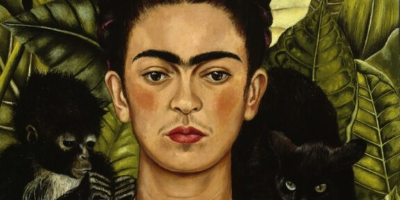 Frida Kahlo autoritratto con scimmia e pantera