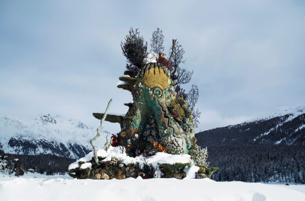 Damien Hirst, The Monk, 2014. Installation image of Lake St. Moritz, 2021. Photographed by Felix Friedmann ©Damien Hirst and Science Ltd. All rights reserved, DACS 2021