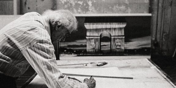 Christo in his studio working on a preparatory drawing for L'Arc de Triomphe, Wrapped New York City, 2020 Photo: Anastas Petkov © 2020 Christo and Jeanne - Claude Foundation