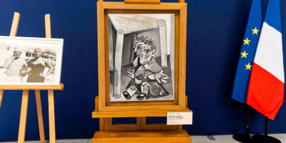 Pablo Picasso, The child with the lollipop sitting under a chair" POOL/AFP