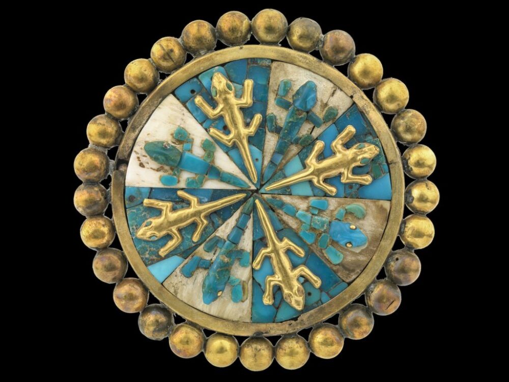 Ear ornament of gold, shell, and stone (turquoise or malachite), depicting eight iguanas. Four of the iguanas are gold and four are turquoise (1 AD-800 AD). Collection of the Museo Larco, Lima, Peru. Photo courtesy of World Heritage Exhibitions.
