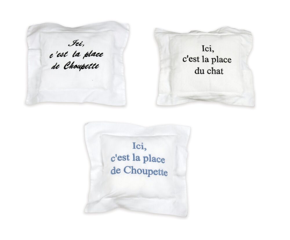 Lot 415, Choupette, Three small embroidered cushions, €100-150