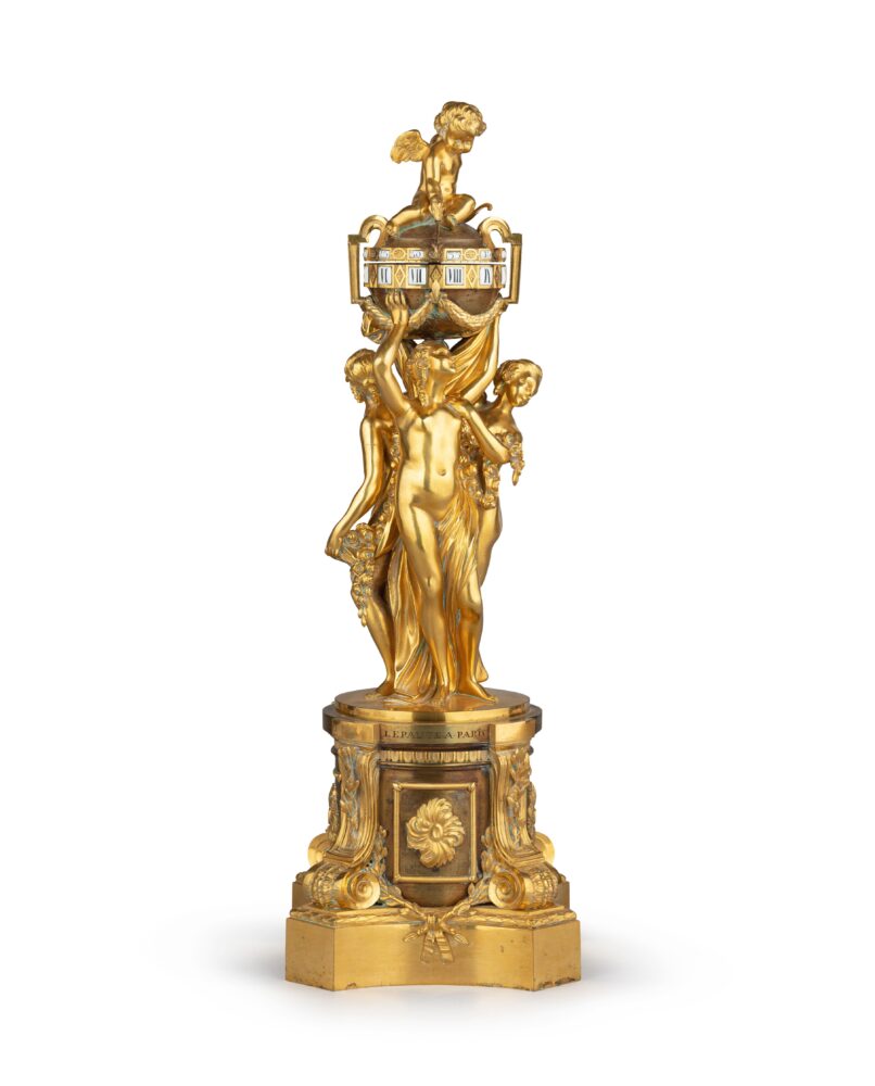 A Louis XVI gilt - bron ze and patinated bronze cercles tournants mantel clock by Lepaute, the case by François Vion Circa 1770 Height 20 in Est : 24,000 – 34,000 EUR