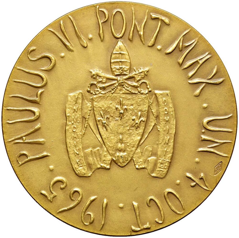 Opera di Lello Scorzelli, questa medaglia ricorda la partecipazione, nel 1965, di Paolo VI all’Assemblea dell’Onu.