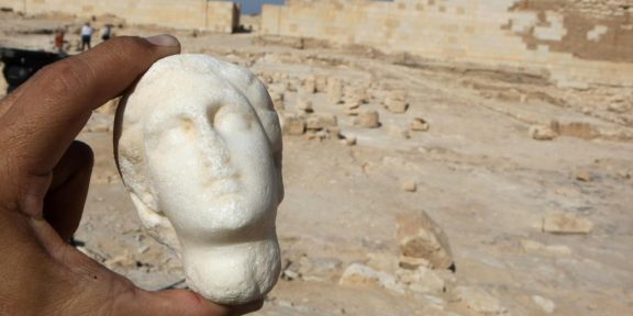 An alabaster statue of Cleopatra is shown to the press at the temple of Tasposiris Magna on the outskirts of Alexandria, on April 19, 2009. Archaeologists are now more convinced than ever that the tomb of Marc Anthony and Cleopatra lies nearby. Photo credit should read Cris Bouroncle/AFP via Getty Images.