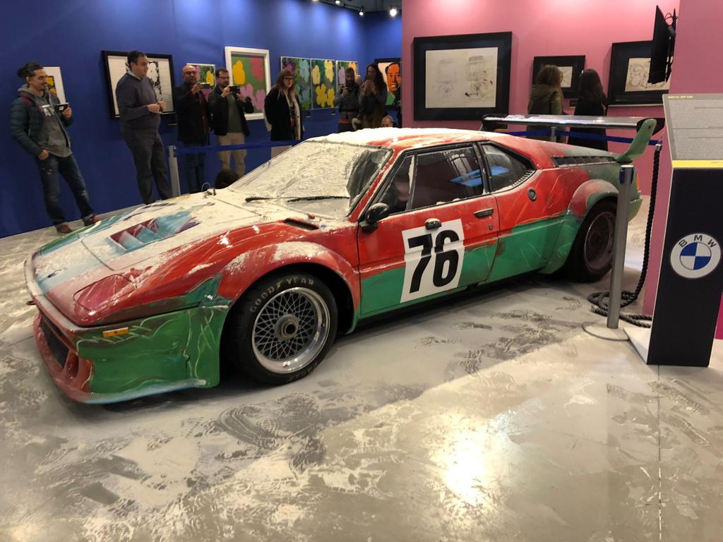 La BMW dipinta a mano da Andy Warhol in mostra a Milano nel mirino degli ambientalisti
