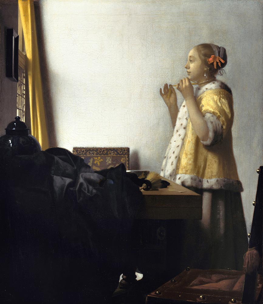 Johannes Vermeer, Woman with a Pearl Necklace (ca. 1662–64). Collection of the Staatliche Museen zu Berlin – Gemäldegalerie.