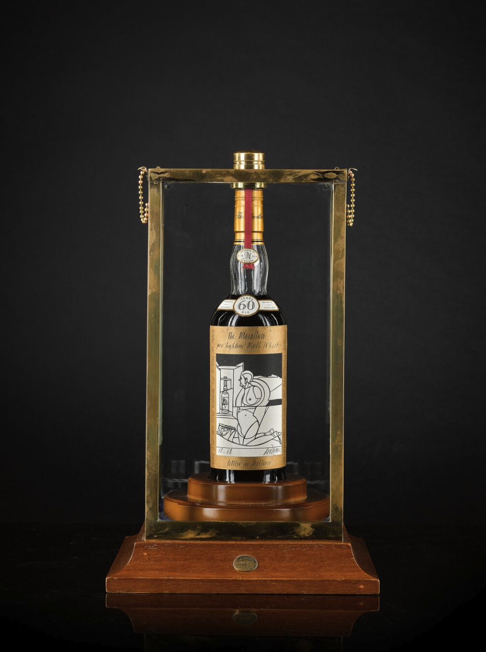 Nuovo record per un liquore all’asta: un whisky Macallan con etichetta di Valerio Adami venduto per 2,6 milioni di dollari