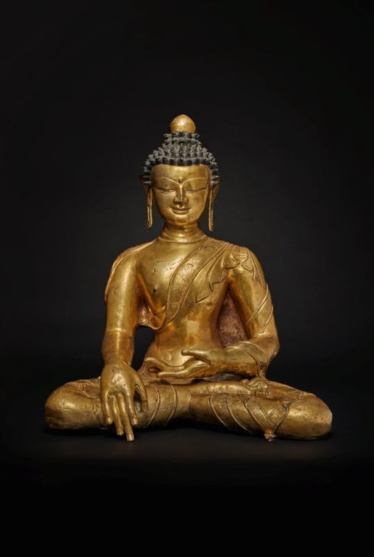 A Large Gilt-Bronze Figure of Shakyamuni Buddha, Tibet, Circa 14th Century