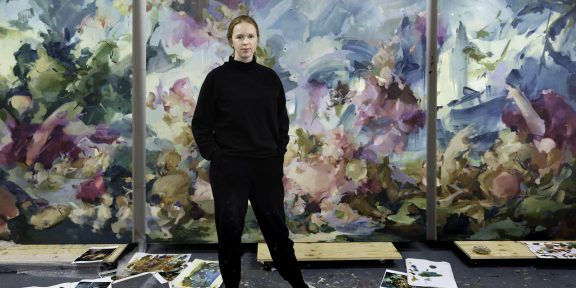 Flora Yukhnovich in her London studio, February 2022. Photo: Eva Herzog © Flora Yukhnovich Courtesy the artist and Victoria Miro