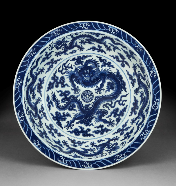 A RARE LARGE BLUE AND WHITE 'DRAGON' DISH YONGZHENG SIX-CHARACTER MARK IN UNDERGLAZE BLUE WITHIN A DOUBLE CIRCLE AND OF THE PERIOD (1723-1735) Estimate USD 300,000 – USD 500,000
