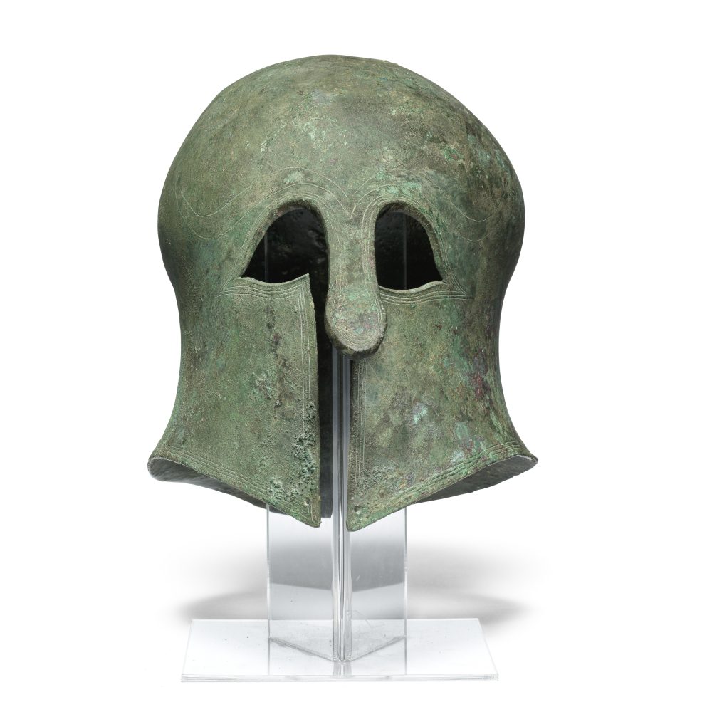 A Greek bronze Corinthian helmet, circa 6th century B.C achieved £102,000