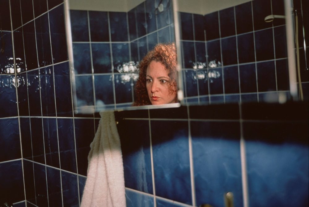 Nan Goldin, Self-portrait on top of Brian, Kissing, NYC