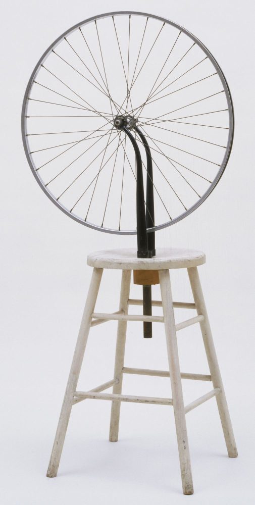 Marcel Duchamp, Bicycle Wheel, 1951 (third version, after lost original of 1913). Metal wheel mounted on painted wood stool, 51 x 25 x 16 ½” (129.5 x 63.5 x 41.9 cm). The Museum of Modern Art, New York