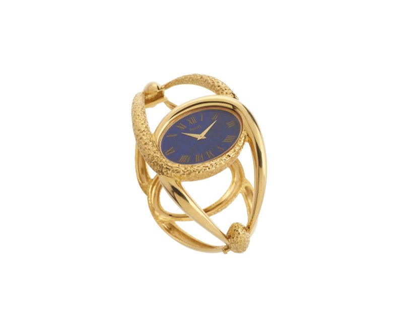 Lotto 126PIAGET Esclave, Ref. 9850, anni 1969–1971. Cassa in oro giallo 18k e quadrante in lapislazzulo. Stima: € 18.000–22.000 Courtesy Capitolium Art