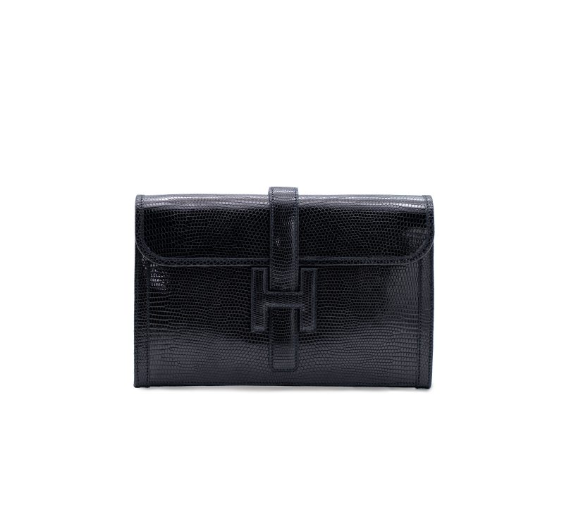 Lotto 193HERMÈS Pochette Jige in lucertola color nero, dust bag (cm 29x18) Valutazione € 2.200 - 2.800 Courtesy Il Ponte Casa d'Aste