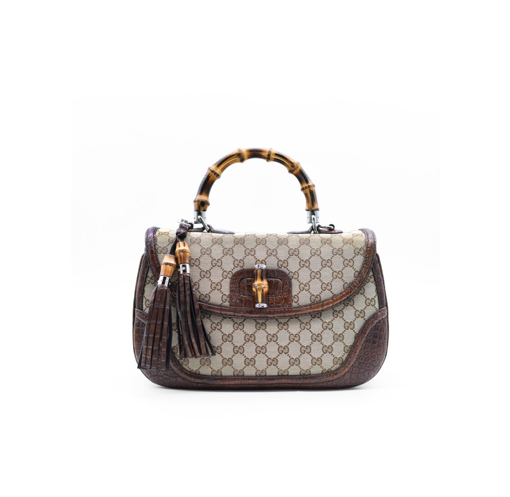 Lotto 285 GUCCI Borsa Bambù Jumbo in pelle logata color marrone/beige, profili in pelle, tracolla in pelle e metallo rimovibile, hardware in metallo color argento, dust bag (cm 36x22) Valutazione € 1.400 - 1.800 Courtesy Il Ponte Casa d'Aste